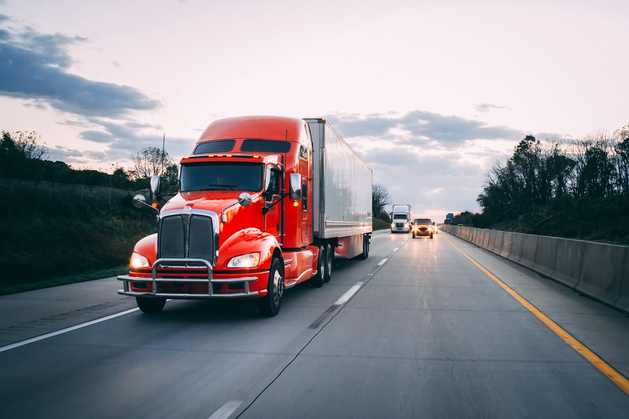 18 wheeler semi-truck on the highway at night